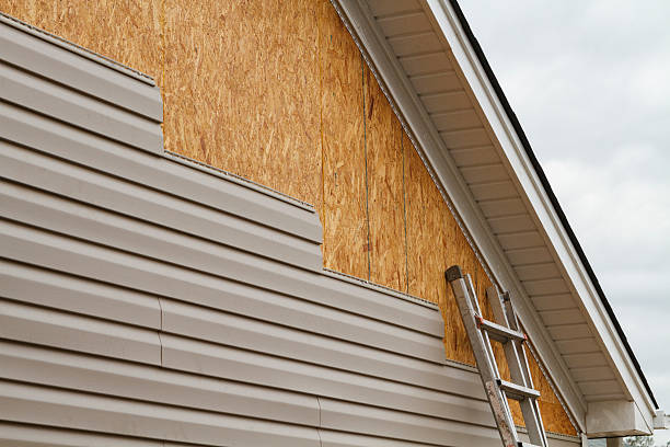 Professional Emergency Siding Repair technician working in Dover, TN
